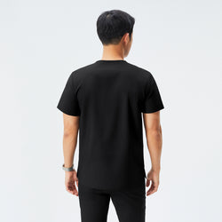 Image of Man wearing black scrubs with short sleeves and matching pants, facing away from the camera,Eco Black