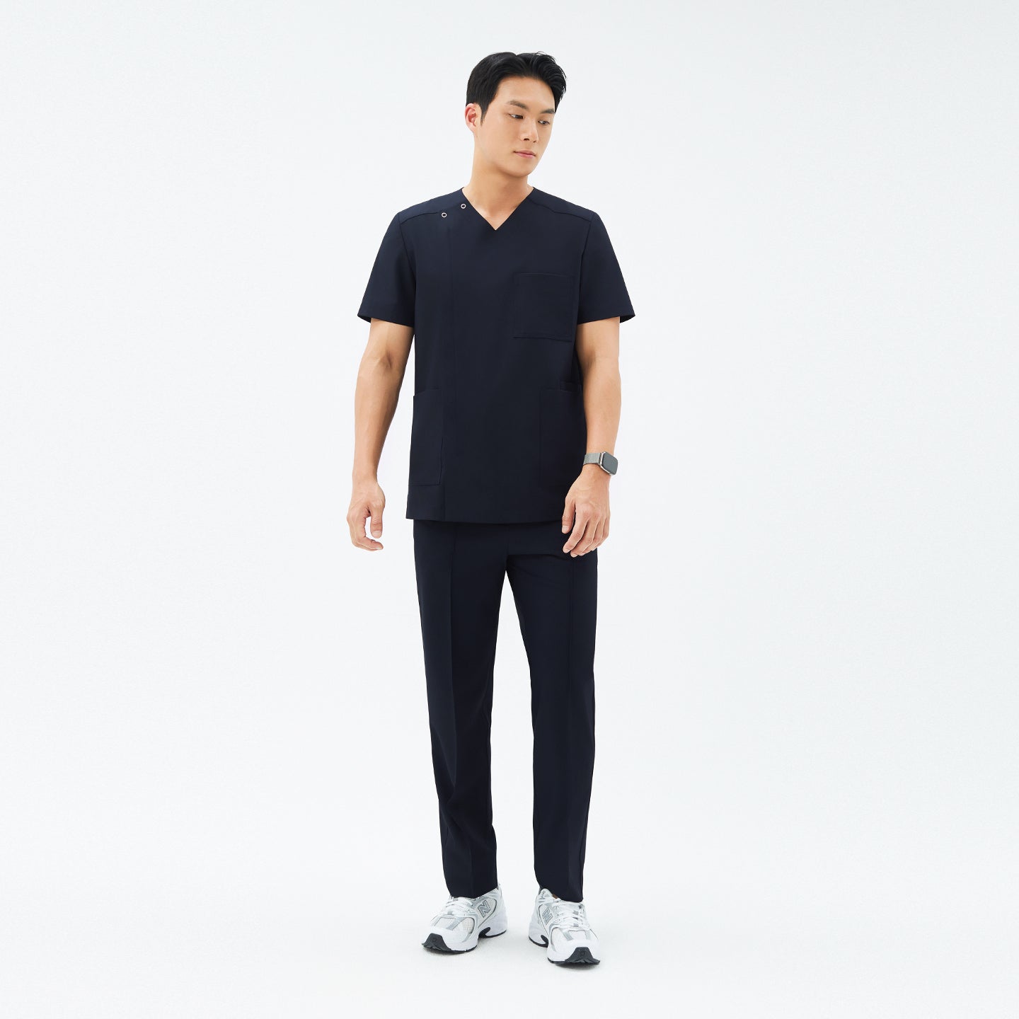 Image of Full-length shot of TUL DS-185 Men's V-Snap Zipper Scrub Top in Eco Navy, paired with matching pants for a cohesive uniform.