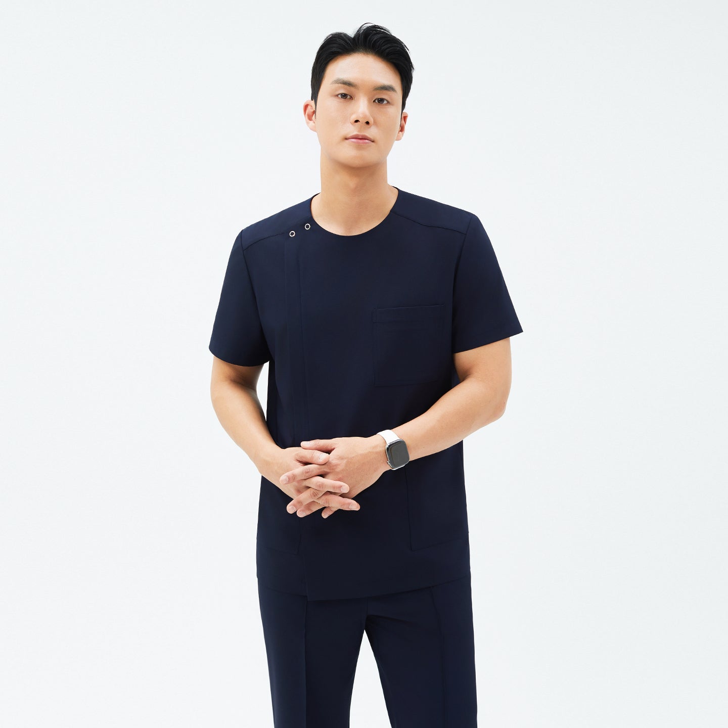 Front view of TUL DS-188 Men's Round Snap Zipper Scrub Top in Eco Navy, showcasing the snap collar, chest pocket, and a sleek, modern fit.
