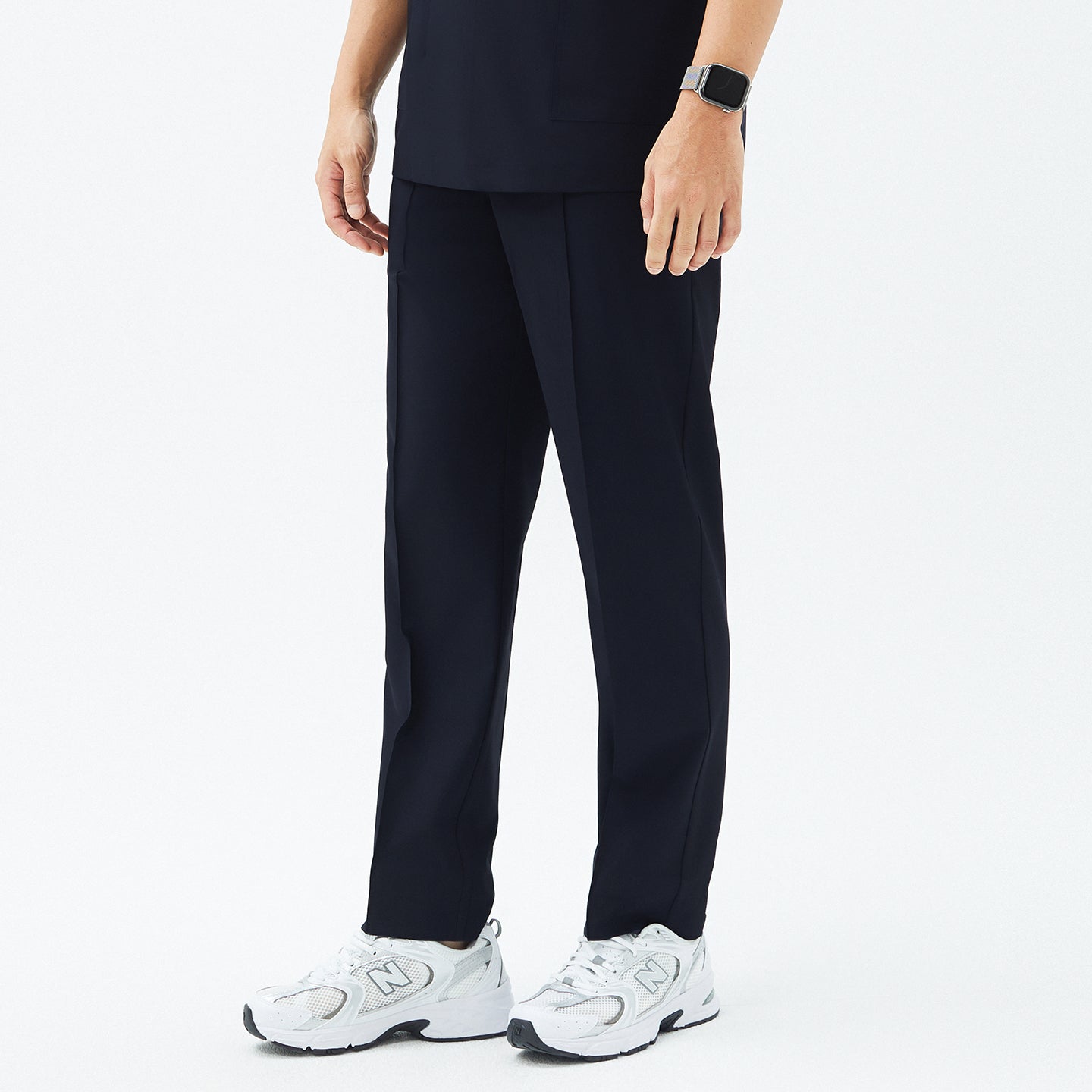 Close-up of TUL Men’s Premium Banding Pants in Eco Navy, showcasing the polished front seam and banding detail for a secure fit.