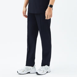 Image of Close-up of TUL Men’s Premium Banding Pants in Eco Navy, showcasing the polished front seam and banding detail for a secure fit.