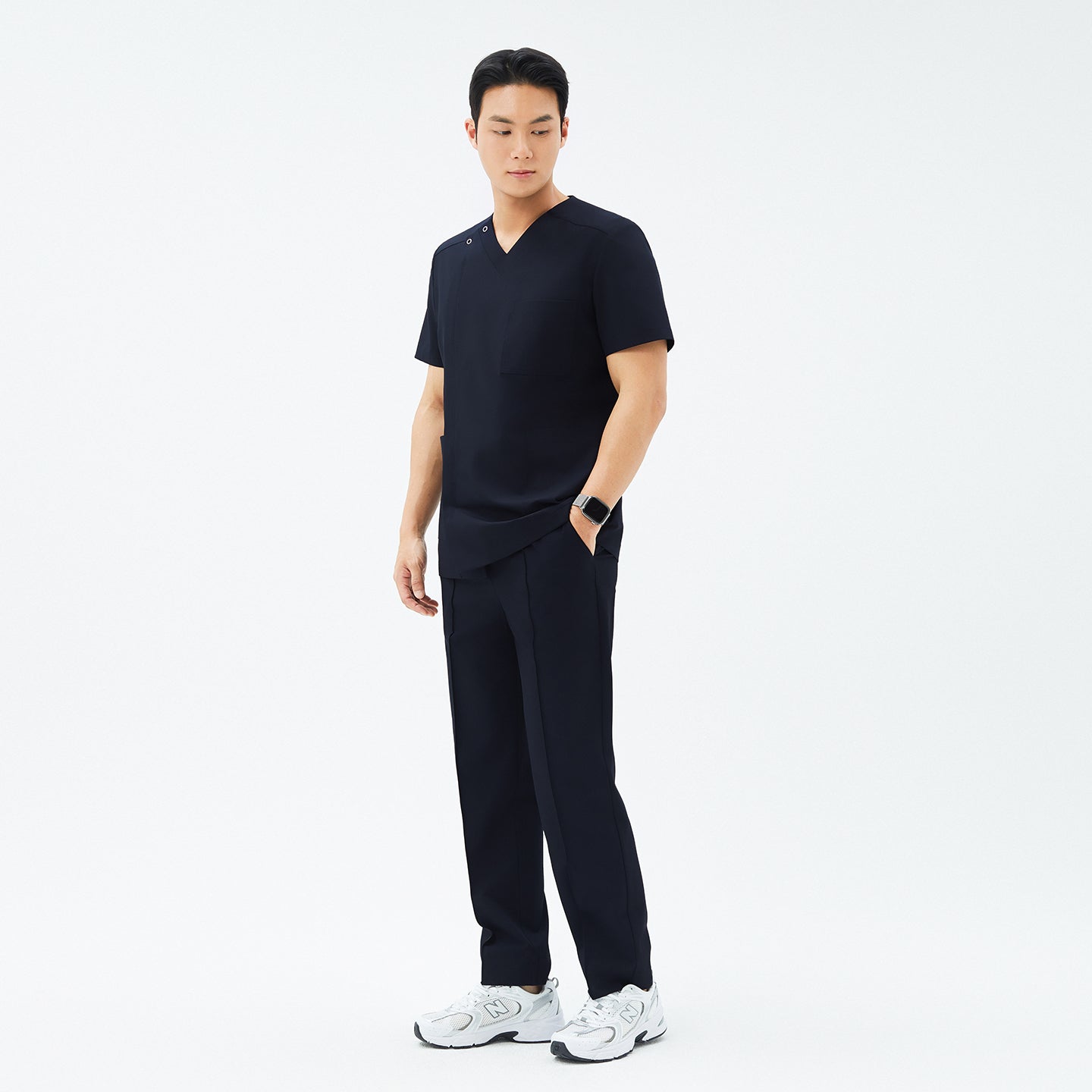 Side angle of TUL Men’s Premium Banding Pants in Eco Navy, emphasizing a streamlined silhouette and durable construction for healthcare professionals.