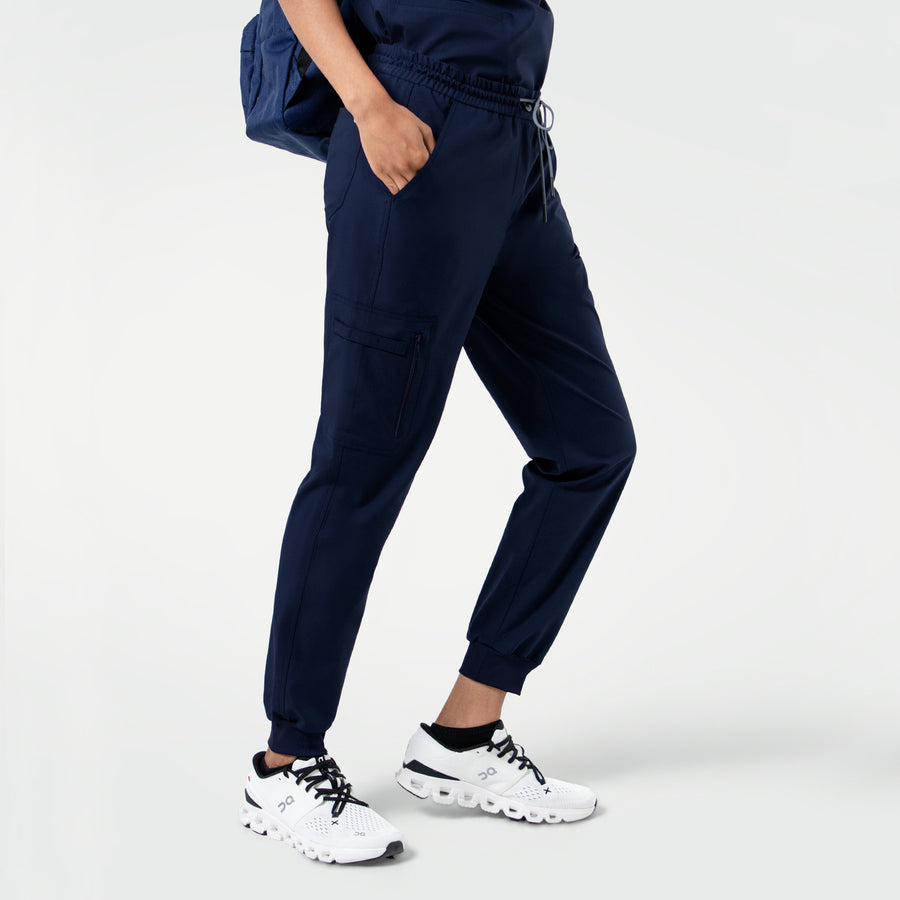 Eco Navy Zipper Pocket Jogger Scrub Pants with drawstring waist, zip cargo pocket, and elastic cuffs for a clean modern fit.
