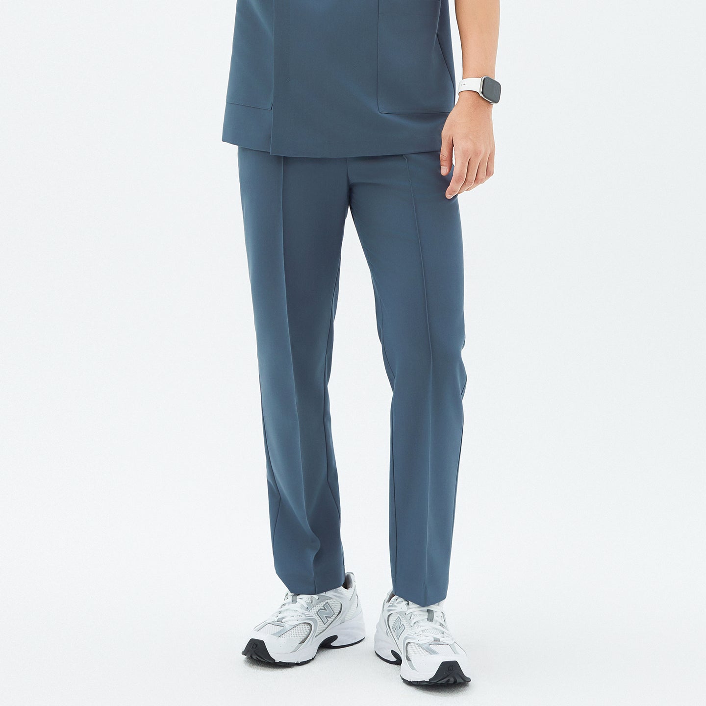 Image of Front view of the TUL Men's Premium Banding Pants in Haze Gray, highlighting the comfortable waistband and sleek silhouette.