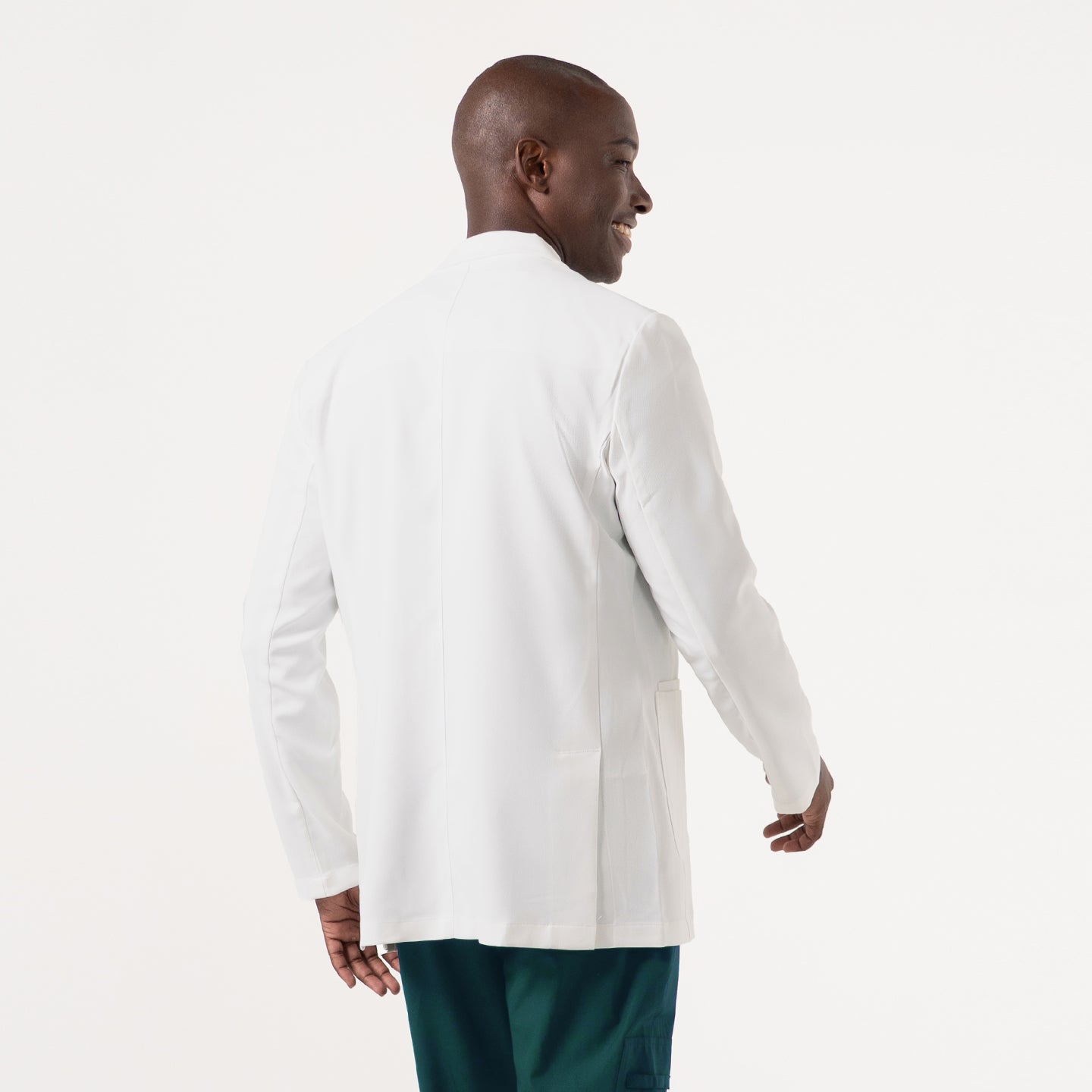 Image of A rear view of the LCM-201 lab coat showcases its clean, streamlined silhouette, featuring a straight back seam, smooth drape, and structured shoulders that emphasize a polished, professional fit suitable for clinical environments.