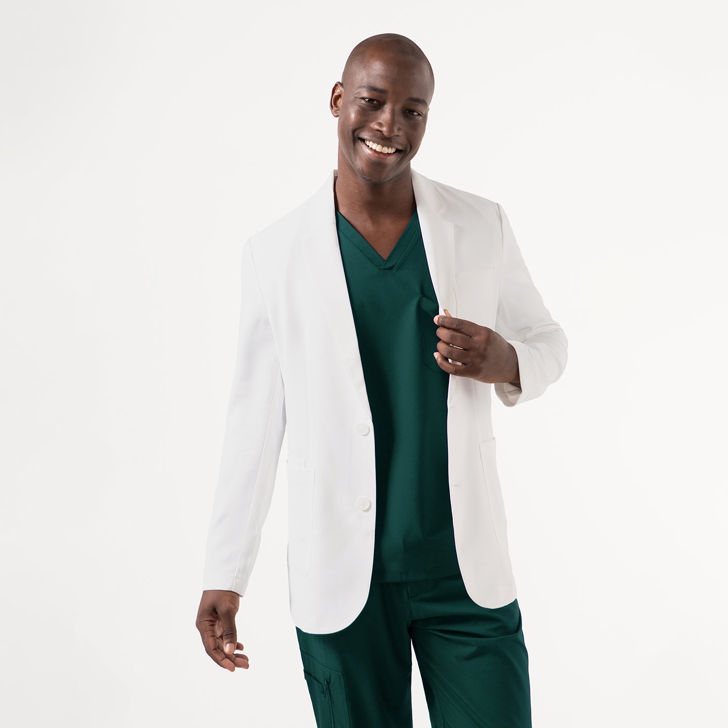 Image of White lab coat Lcm-201, male model wearing with clean front placket and tailored long-sleeve fit, front view.