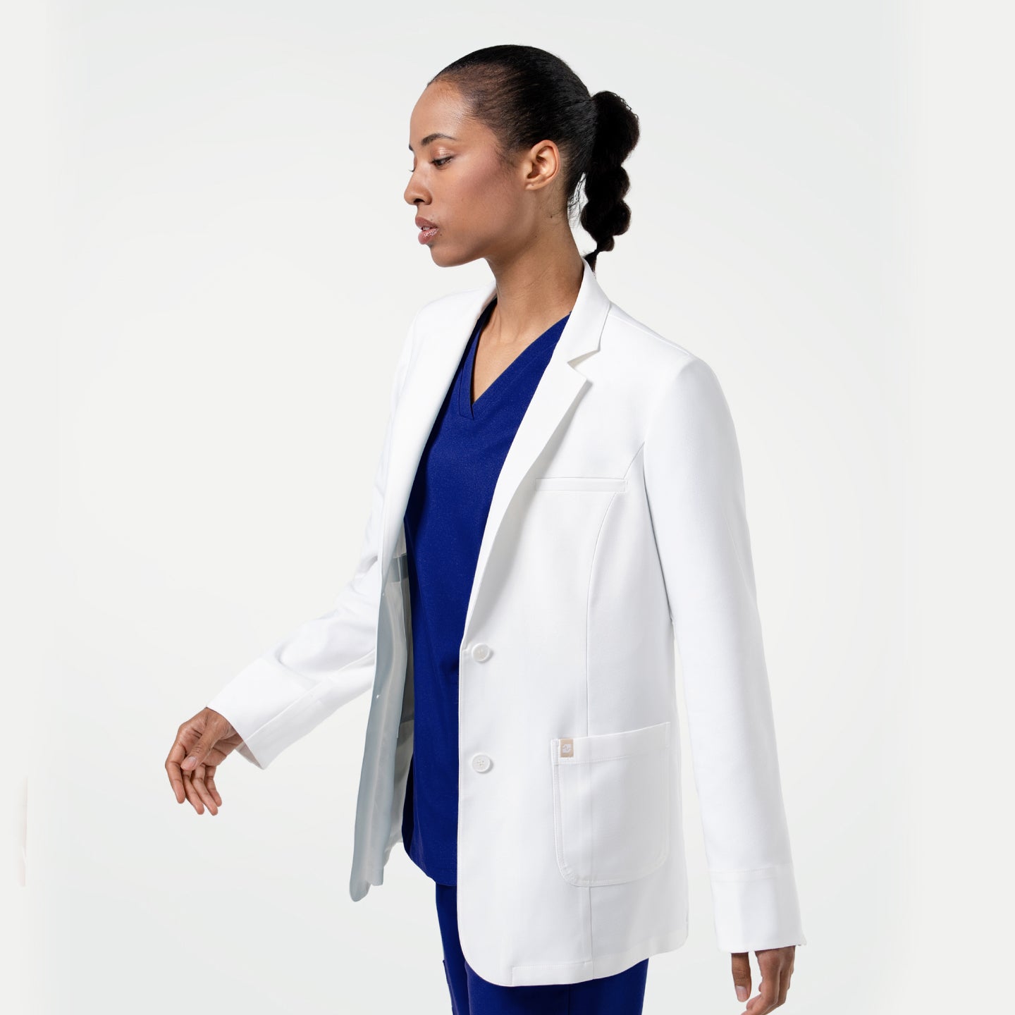 Image of LCW-202 lab coat displays a smooth, tailored silhouette with a crisp center-back seam and subtle shaping along the shoulders and waist, highlighting its refined structure and comfortable fit.