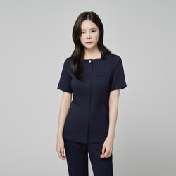 Image of Front view of TUL NS-172 Women’s Modern Square Collar Scrub Top in Mir Navy, highlighting a sleek square neckline and button detail.