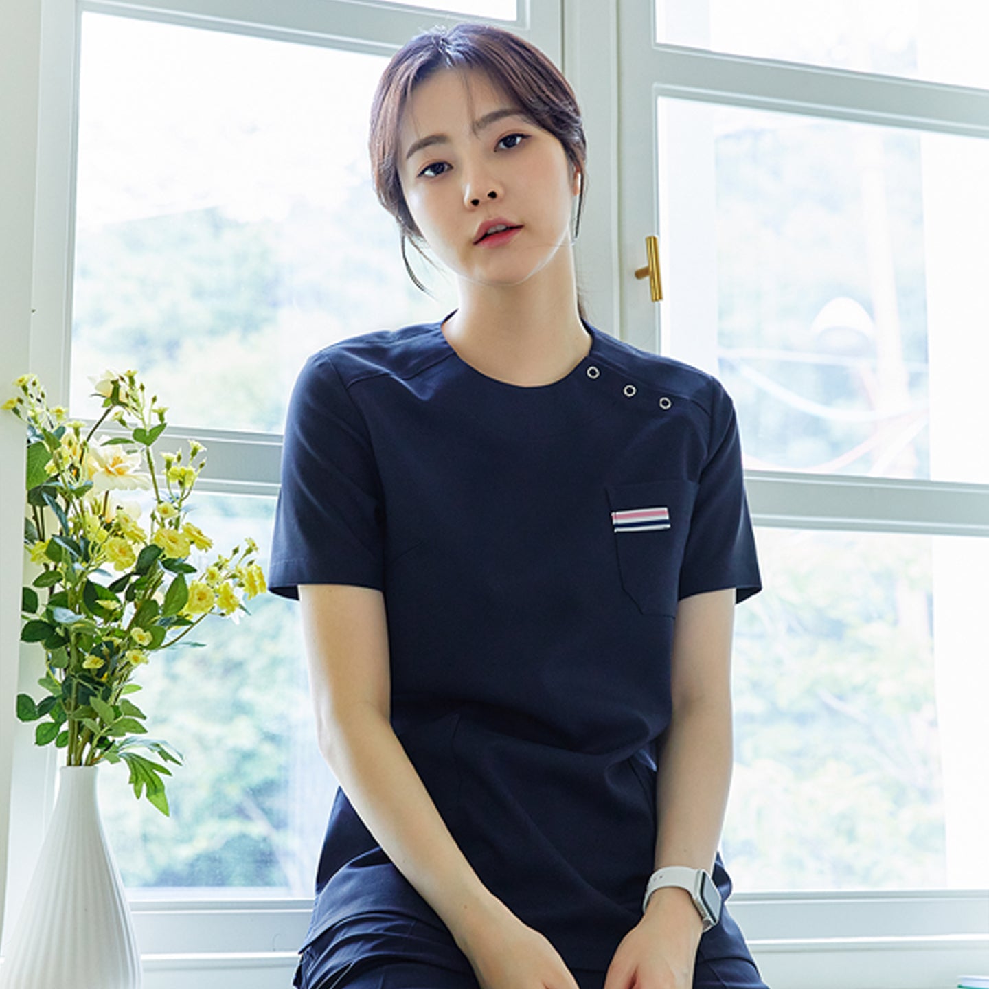 Image of TUL | OS-133 Women's Snap Button Scrub Top - Mir Navy