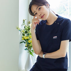 Image of TUL | OS-133 Women's Snap Button Scrub Top - Mir Navy