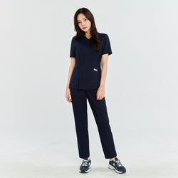 Image of TUL | OS-134 Women's Front Zipper Scrub Top - Mir Navy