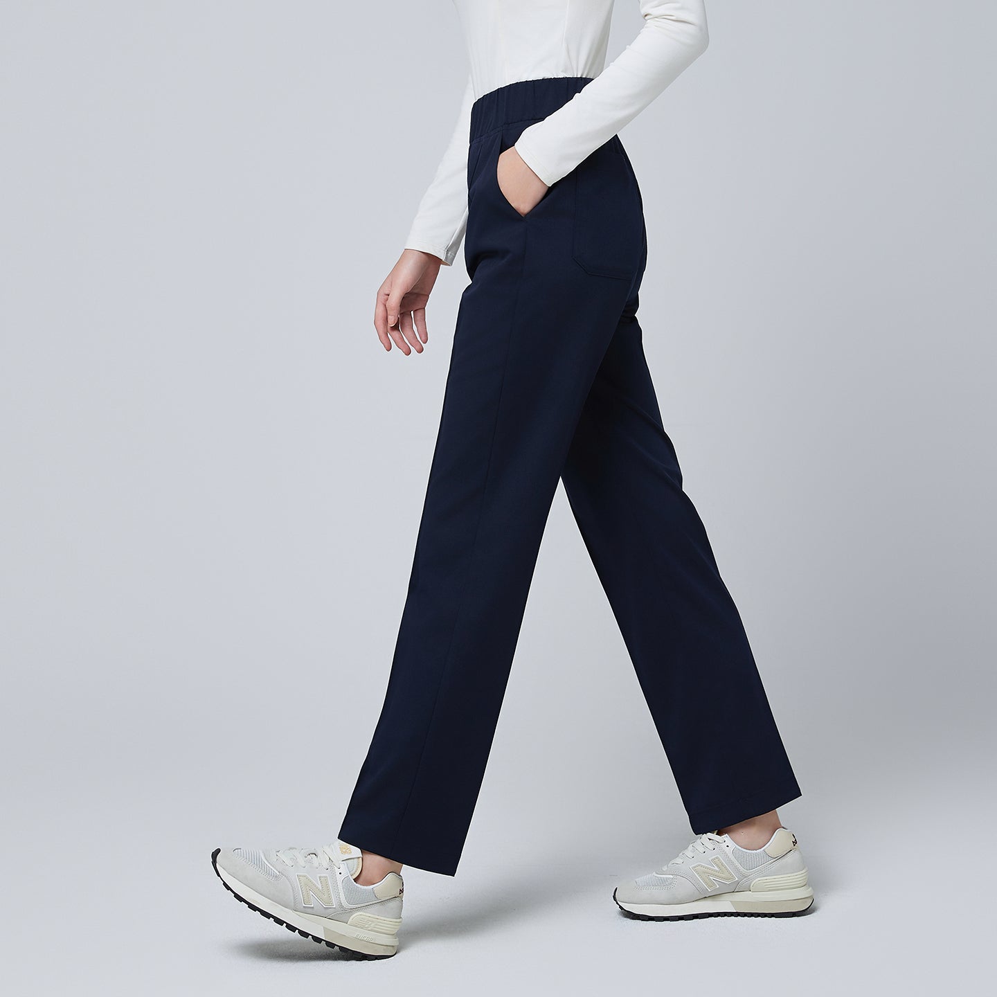 Image of Back view of TUL Women's Premium Banding Pants in Mir Navy, emphasizing the clean, structured silhouette and high-quality fabric.