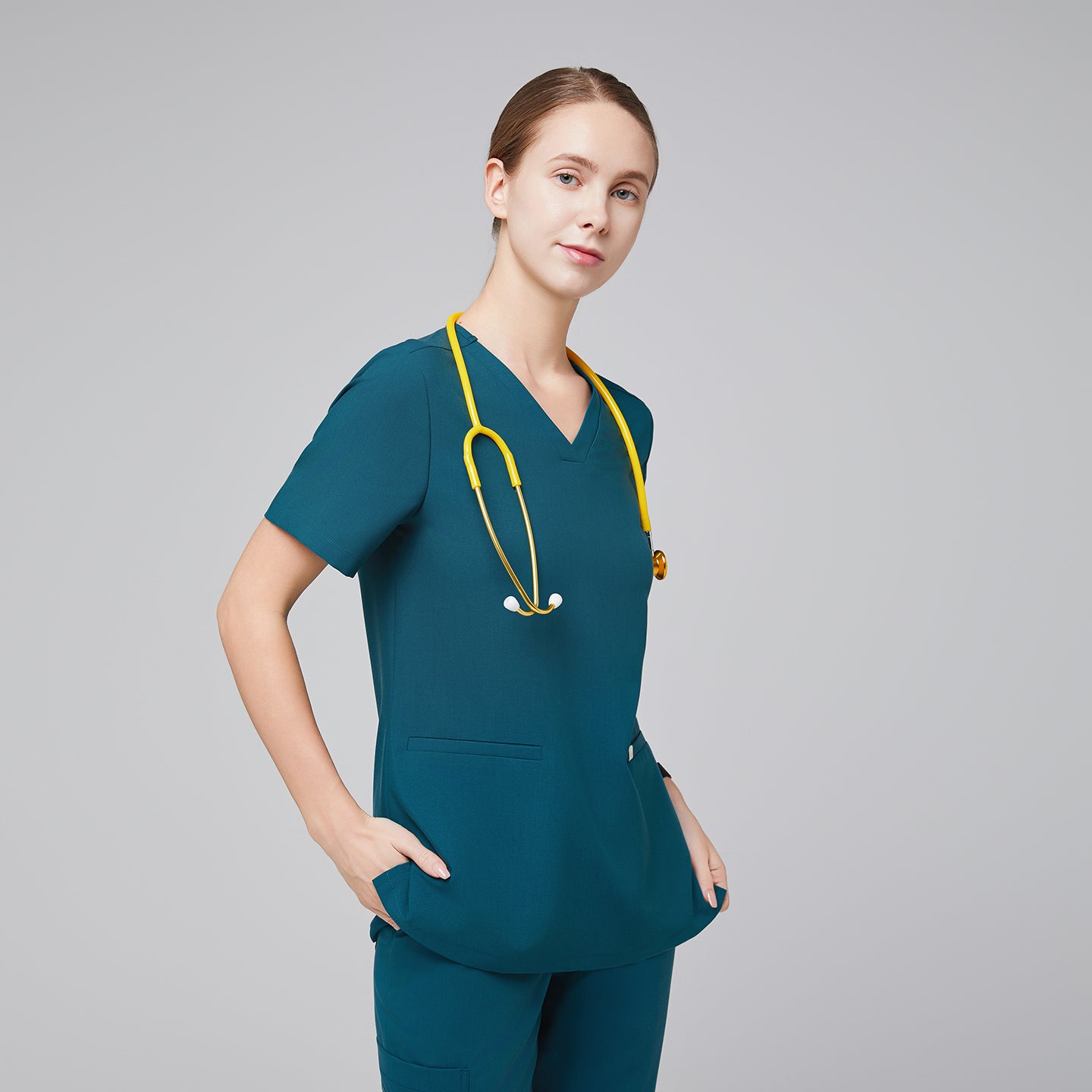 Image of Ocean teal Women's Double Pocket Scrub Top with matching ocean teal scrub pants,Ocean teal