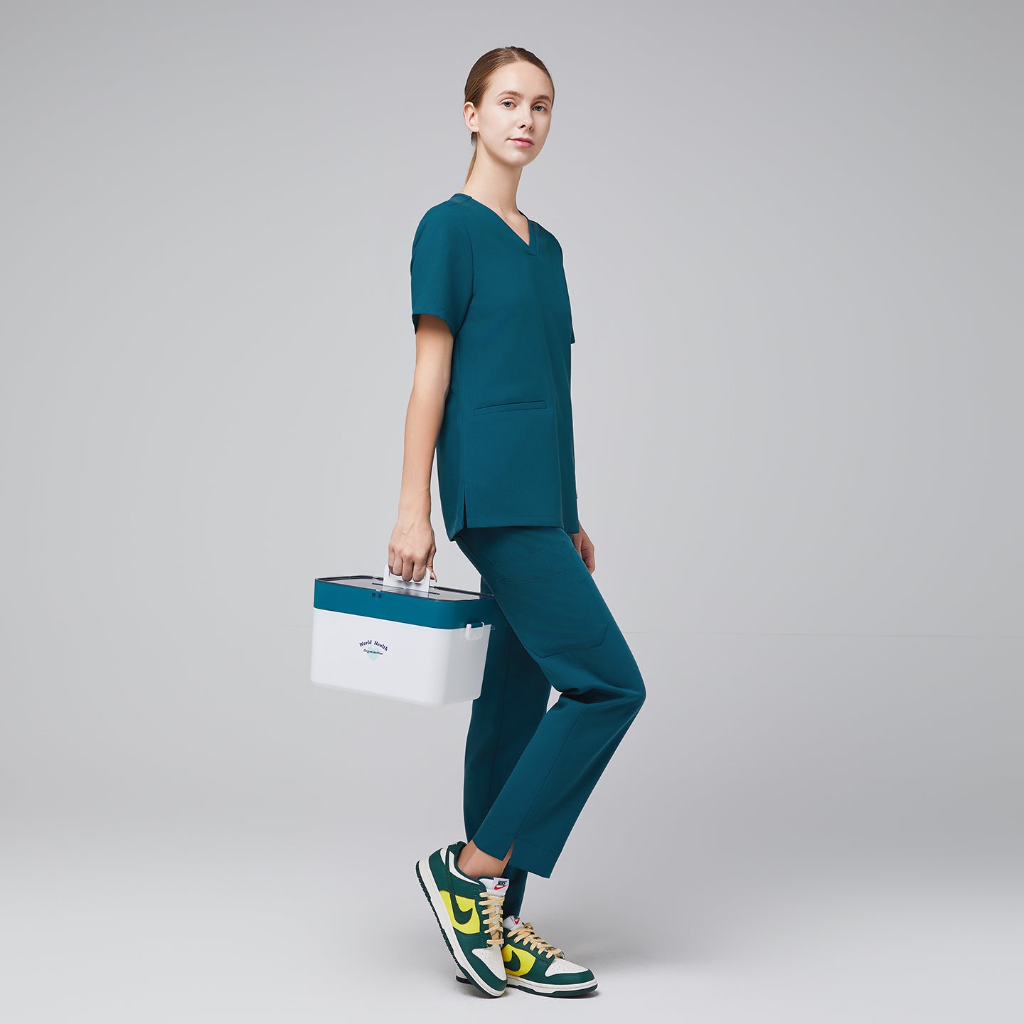 Image of Ocean teal Women's Double Pocket Scrub Top with matching ocean teal scrub pants,Ocean teal