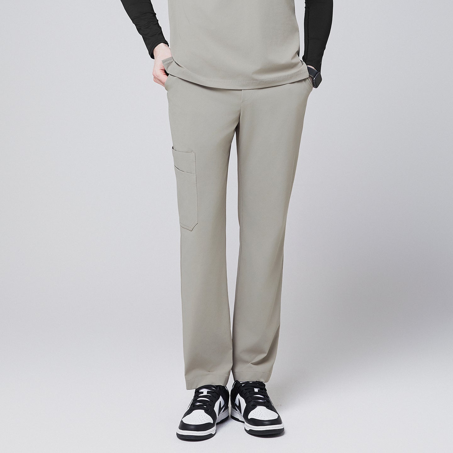 Sand khaki straight-leg scrub pants with a side pocket, paired with a matching top and black-and-white sneakers,Sand Khaki