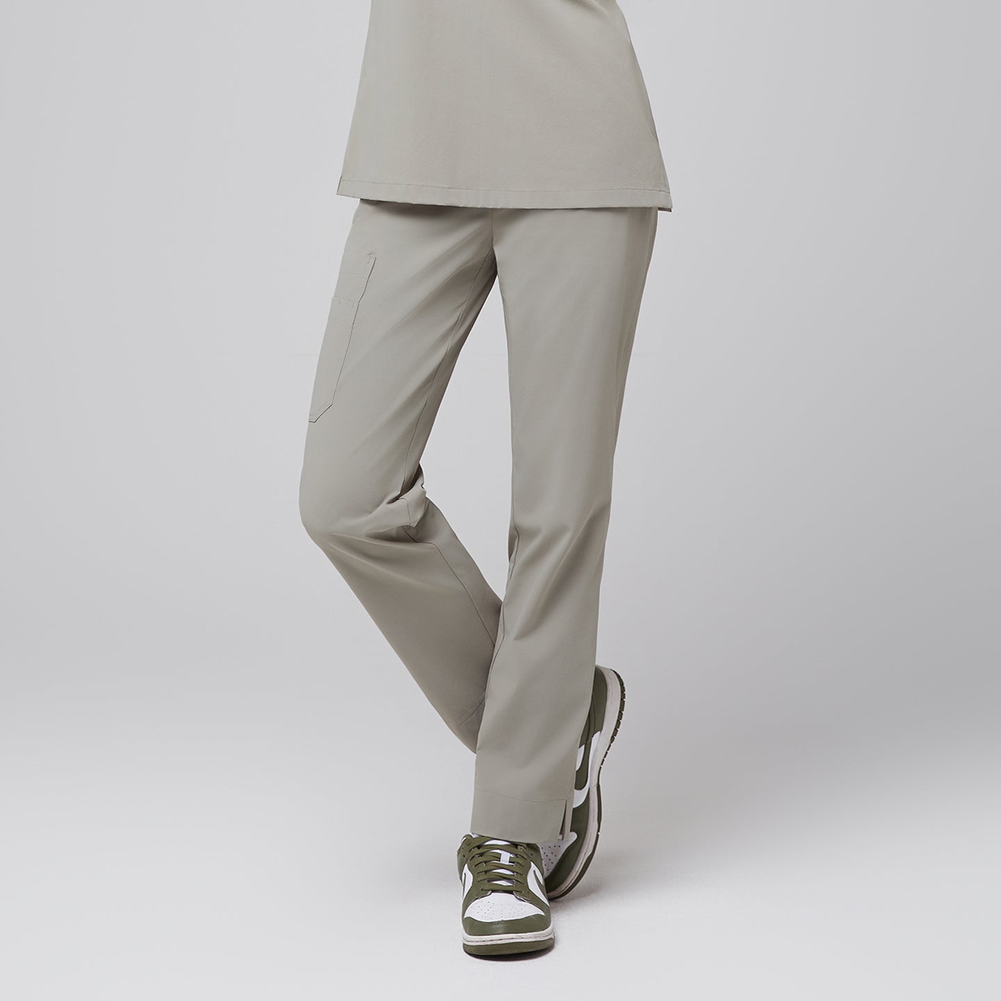 Image of Sand Khaki Straight Split Hem Scrub Pants with relaxed straight-leg fit, side pocket, and subtle ankle slit detail for easy movement.