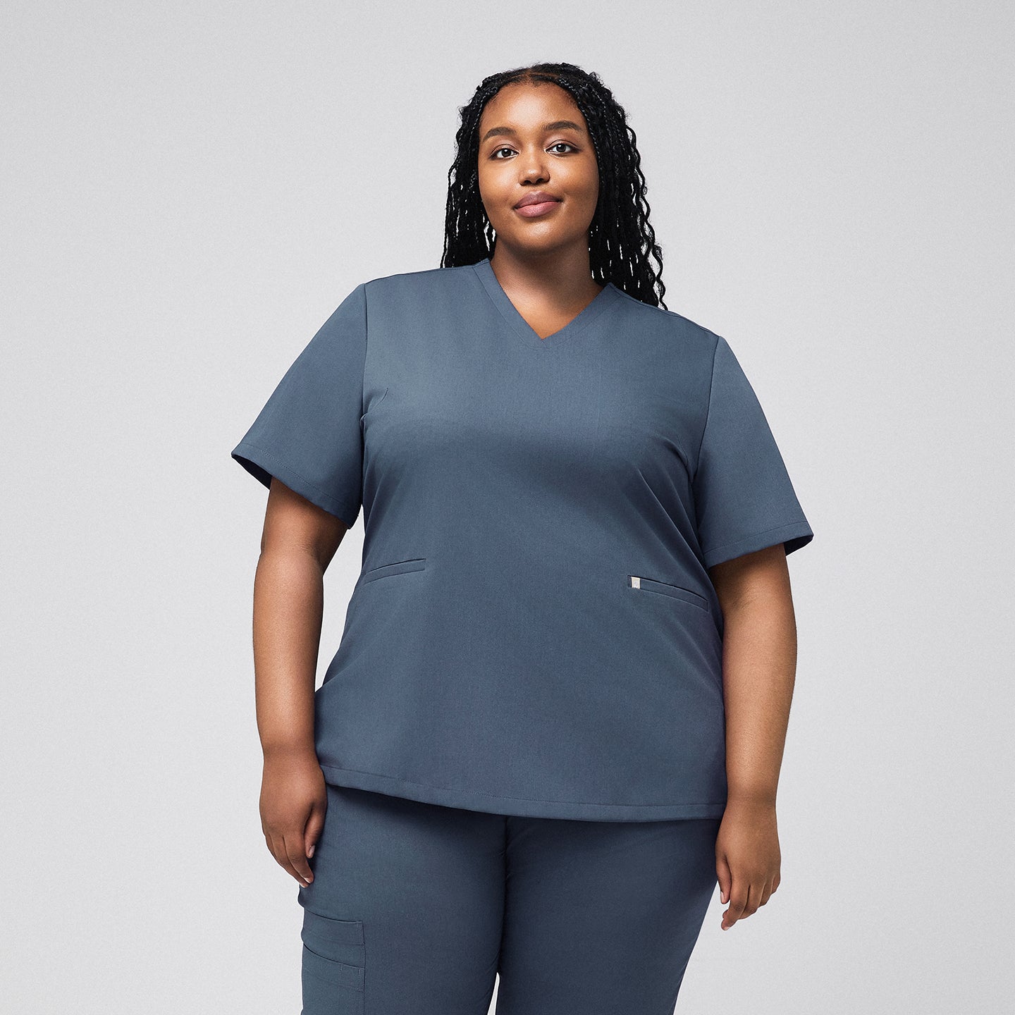 Image of Plus-size healthcare professional in smoky blue scrub set with double pockets,Smoky Blue