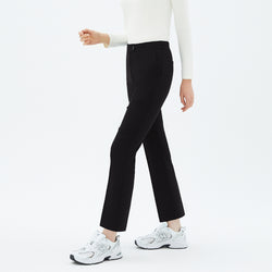 Image of Model walking in TUL Women's Comfort Banding Pants in Stretch Black, emphasizing a straight-leg cut and comfortable stretch fabric.