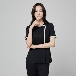 Image of Front view of TUL NS-175 Women’s Check Beige Round Collar Scrub Top in Stretch Black, showcasing subtle beige accents and a modern round collar.
