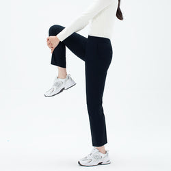 Image of Side view of TUL Women's Comfort Banding Pants in Stretch Navy, showing a flexible waistband and comfortable, tapered fit.