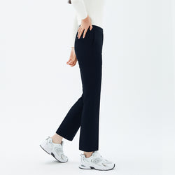 Image of Side angle of TUL Women's Comfort Banding Pants in Stretch Navy, showcasing a tapered leg and comfortable stretch fabric.