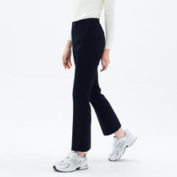 Image of Model wearing TUL Women's Comfort Banding Pants in Stretch Navy, emphasizing the flattering straight-leg silhouette and breathable material.
