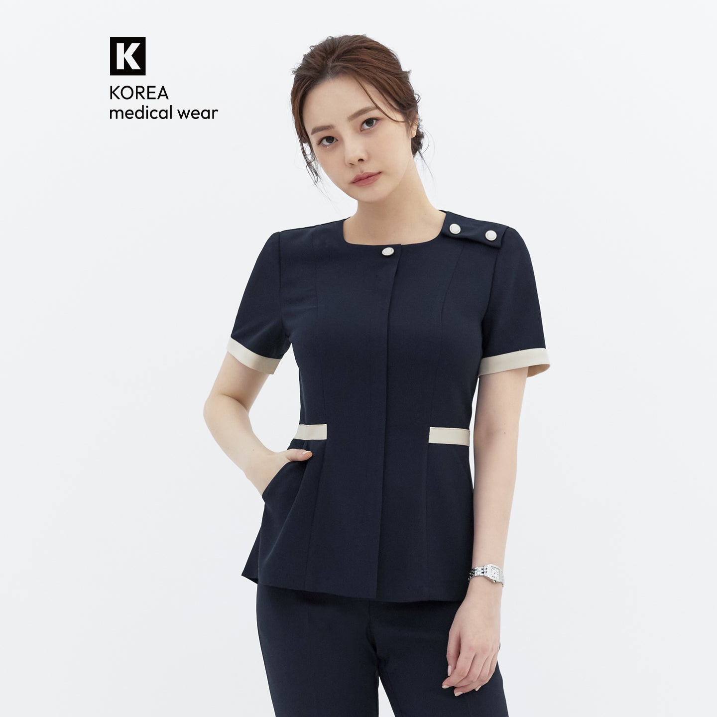 Image of Front view of TUL NCS-01 Women’s Classic Accent Scrub Top in Stretch Navy, showcasing subtle accent detail and a flattering fit.