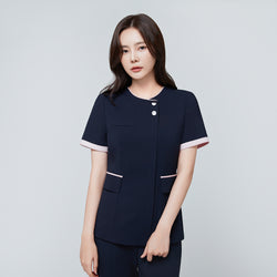 Image of Front view of TUL NCS-04 Women’s Blush Edge Scrub Top in Stretch Navy, highlighting pink accent trim on the sleeves and collar.