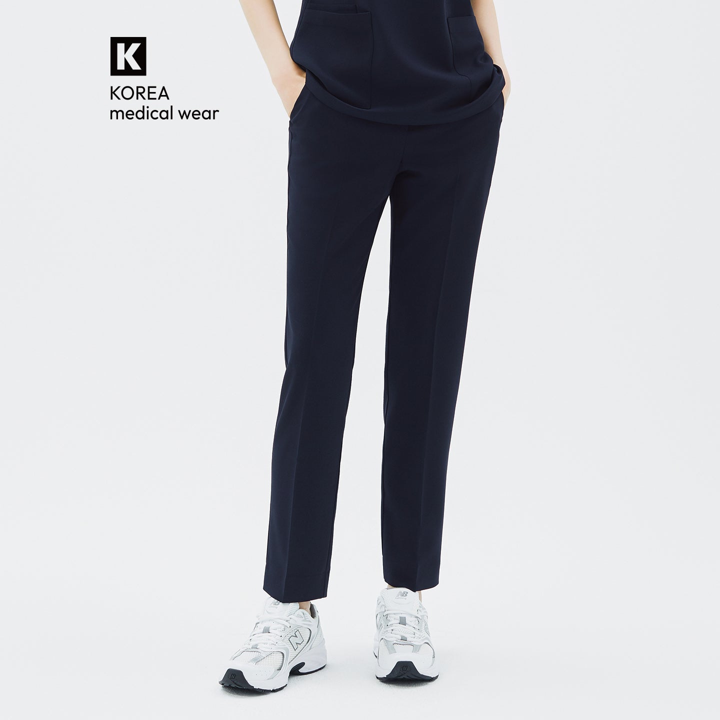 Image of Front view of TUL Women's Style Pants in Stretch Navy, highlighting a slim, tailored leg and practical front pockets.