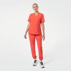 Image of Zenir | Women's Double Pocket Scrub Top - Tiger Orange