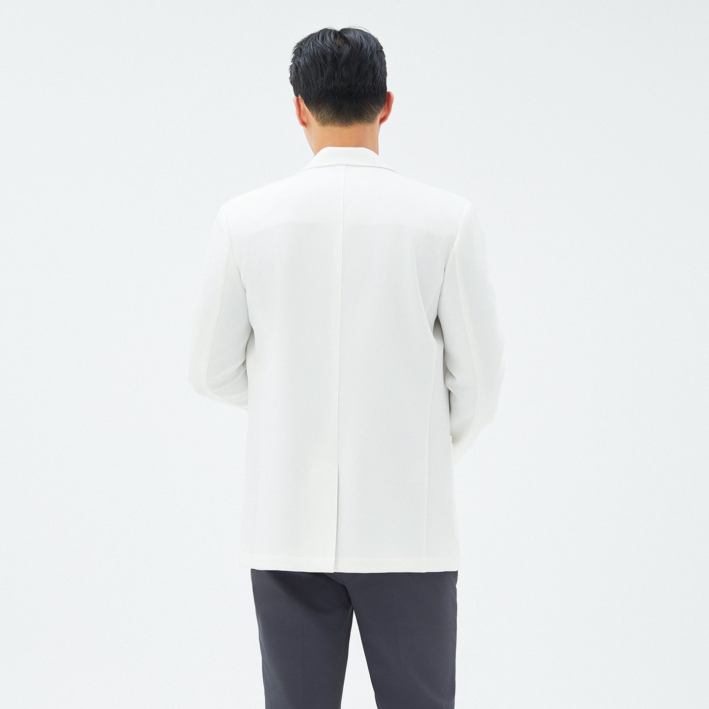 Image of Back view of TUL LCM-12 Men's Short Lab Coat in White Ivory, showing structured shoulders and a neatly finished hem for a professional look.
