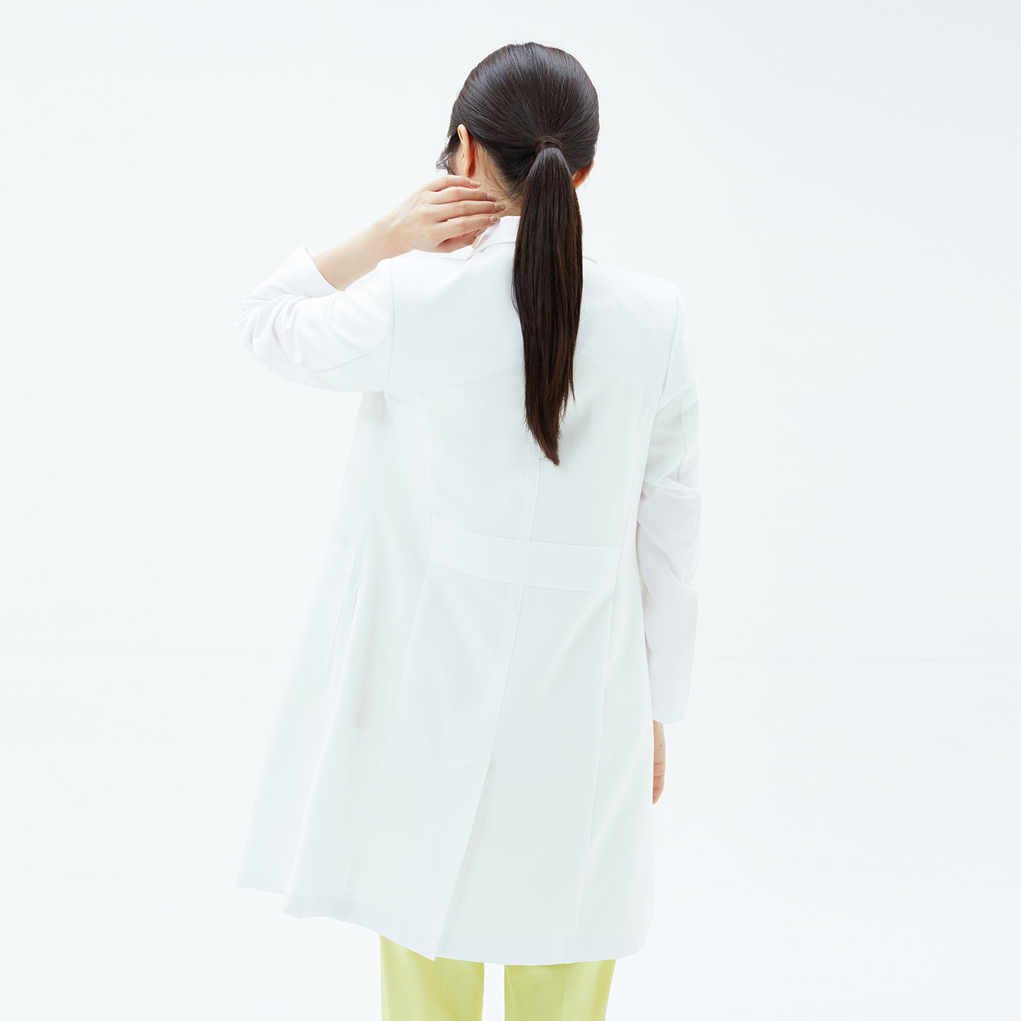 Image of Back view of the TUL LCW-17 Straight Long Lab Coat in White, showing clean rear seams and long hem.