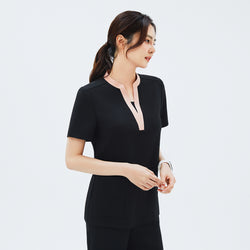 Image of Side angle of TUL NS-178 Women's V-Stretch Color Scrub Top in YT Black, highlighting the tailored fit, draped sleeve edges, and the modern stretch fabric design.