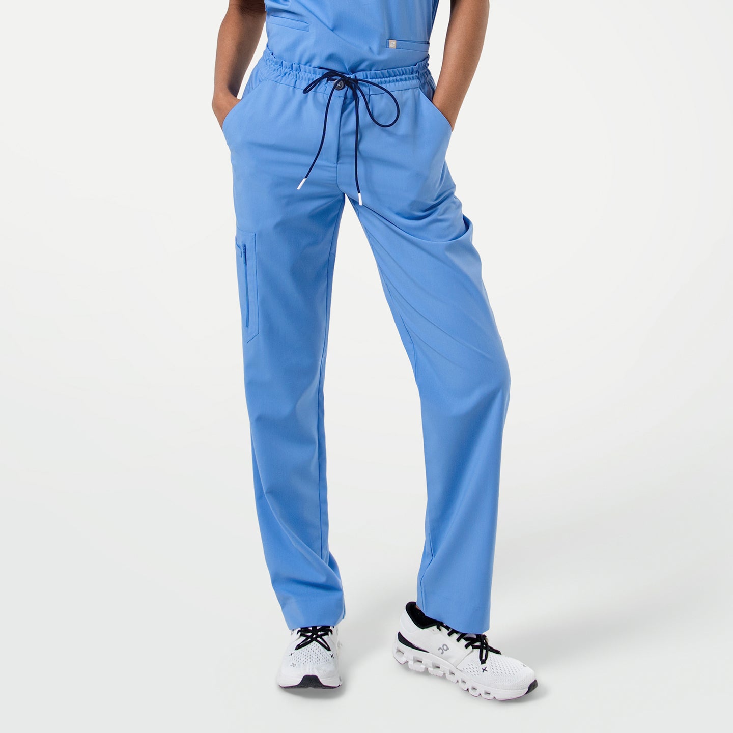 Image of Zipper Pocket Split Hem Scrub Pants in Ceil Blue, displayed from the front with a relaxed fit.